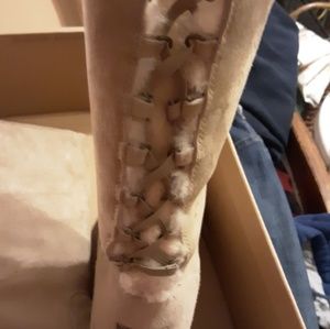Size 9 Ugg tall boots.